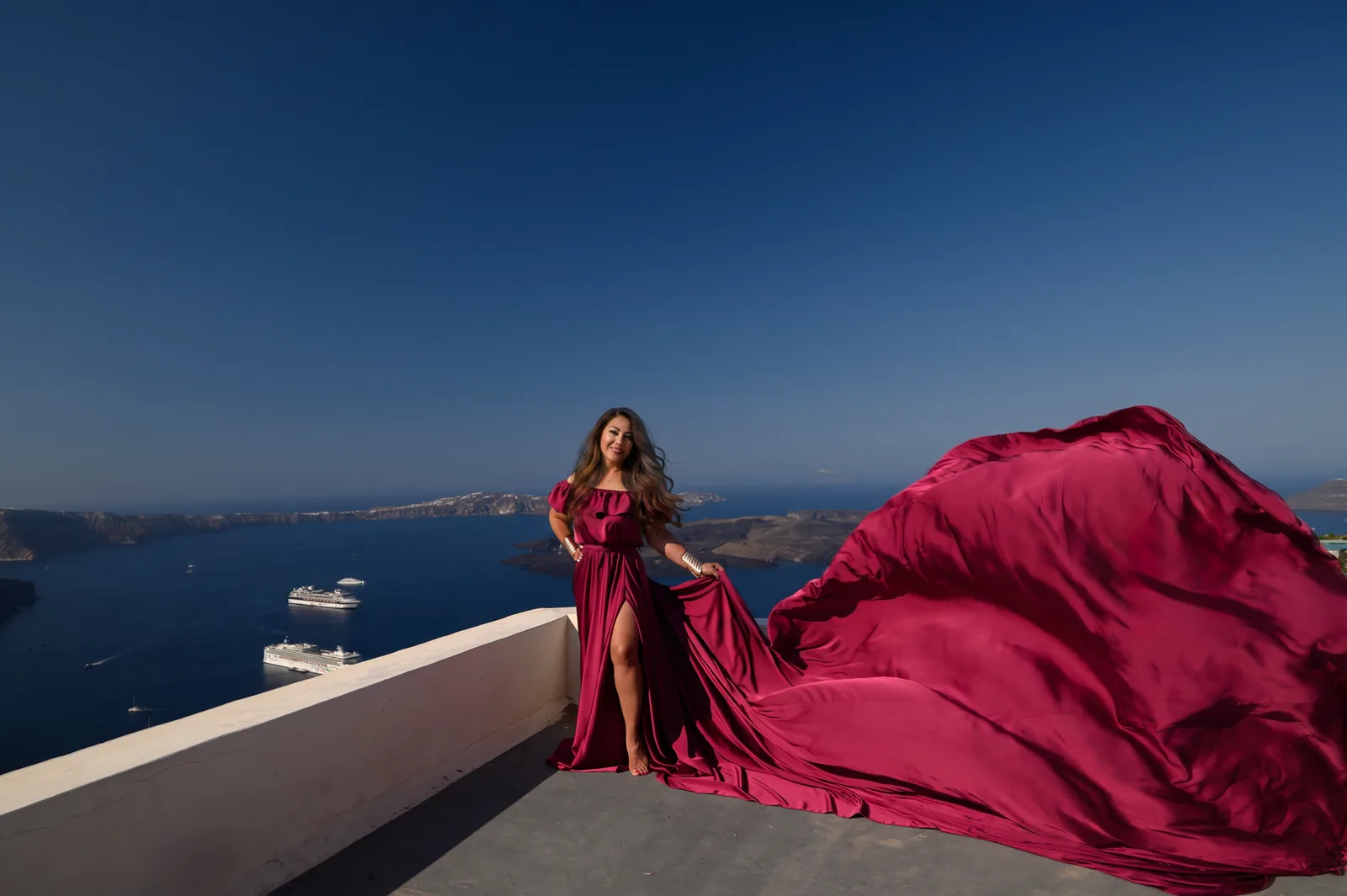 Burgundy Muse flying dress in Santorini
